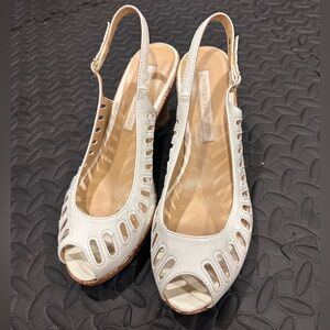 Vintagey vibe white wedges. Size 9. Perfect condition. Springy shoes!
